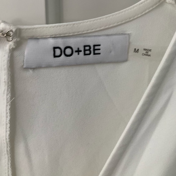 Ivory flutter sleeve ruffle dress. - Picture 2 of 5